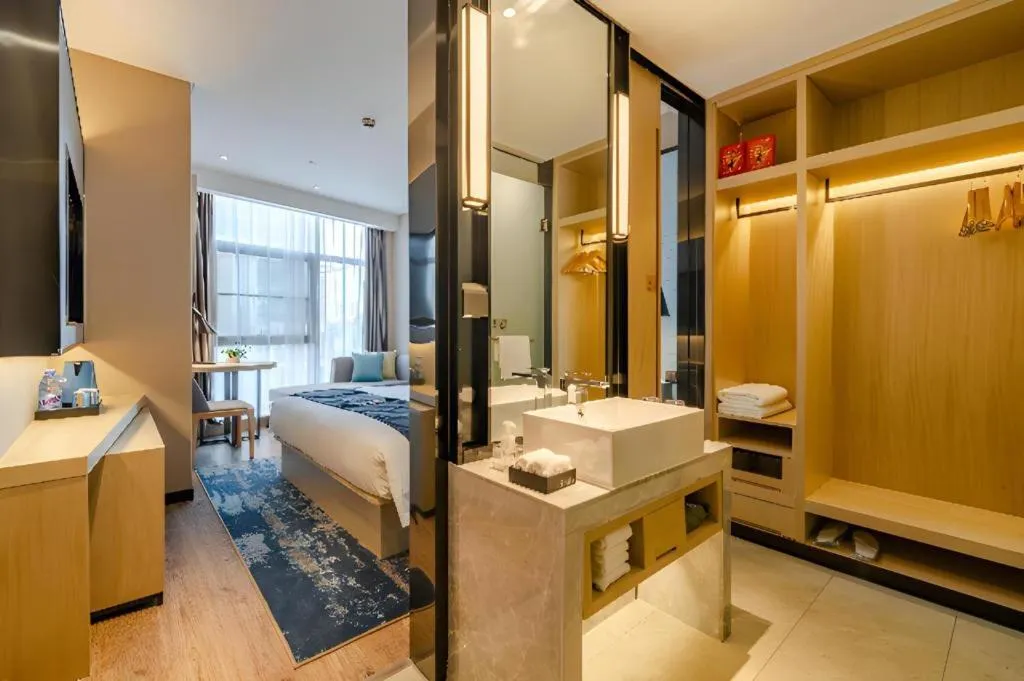 Bed in Echarm Hotel Hefei West Qilitang Metro Station