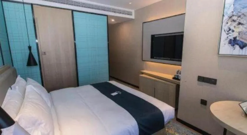 Bed in Echarm Hotel Hefei West Qilitang Metro Station