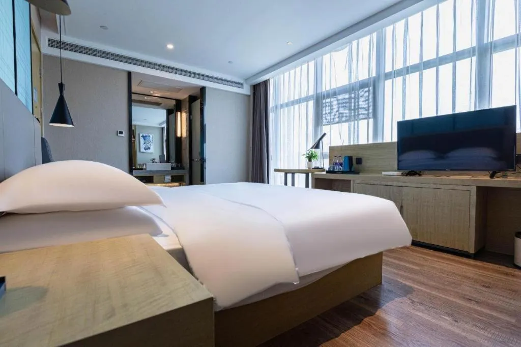 Bed in Echarm Hotel Hefei West Qilitang Metro Station