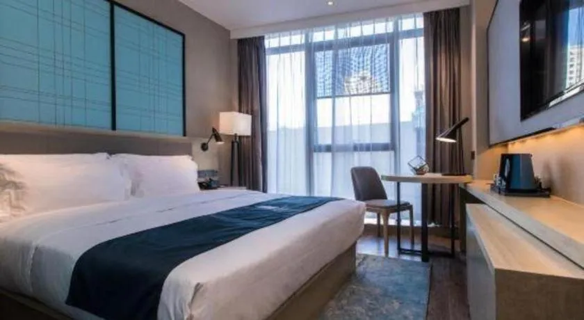 Bed in Echarm Hotel Hefei West Qilitang Metro Station