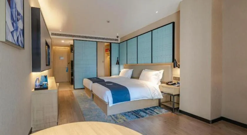 Bed in Echarm Hotel Hefei West Qilitang Metro Station