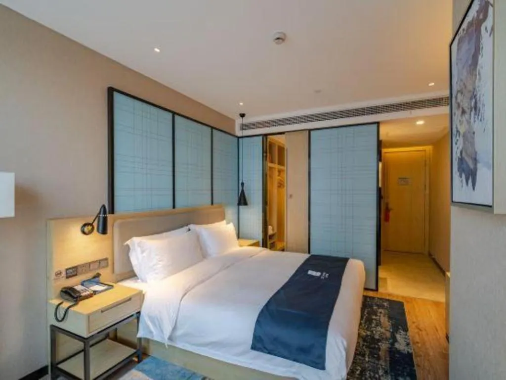 Bed in Echarm Hotel Hefei West Qilitang Metro Station