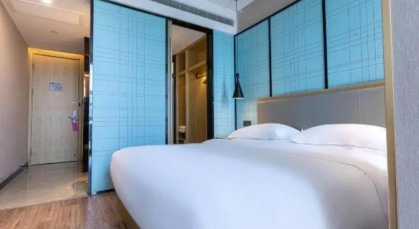 Bed in Echarm Hotel Hefei West Qilitang Metro Station