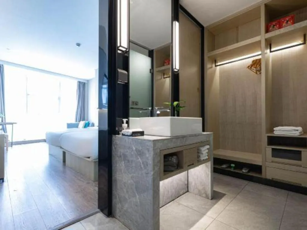 Bed in Echarm Hotel Hefei West Qilitang Metro Station