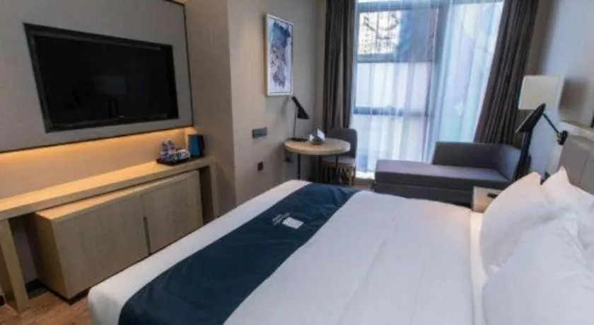 Bed in Echarm Hotel Hefei West Qilitang Metro Station