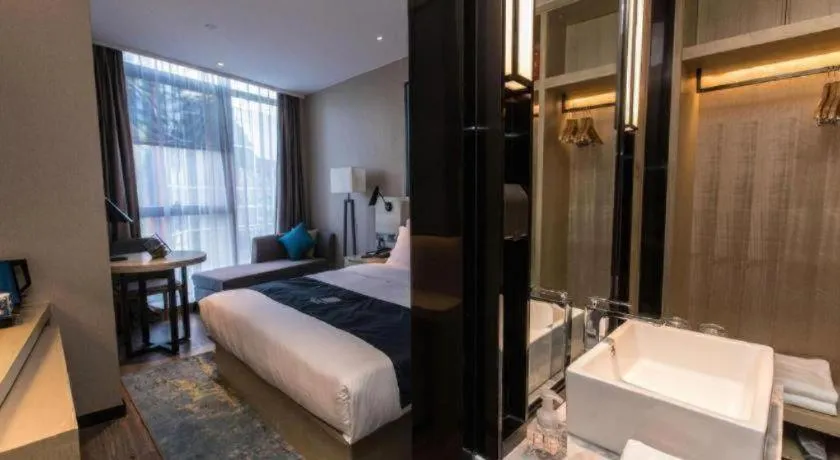 Bed in Echarm Hotel Hefei West Qilitang Metro Station