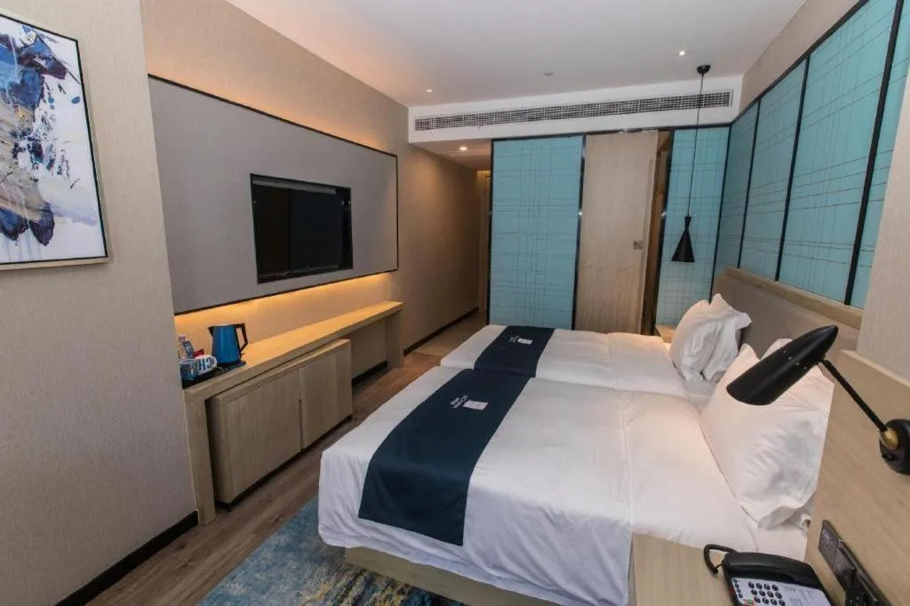 Bed in Echarm Hotel Hefei West Qilitang Metro Station