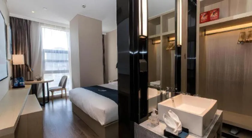 Bed in Echarm Hotel Hefei West Qilitang Metro Station