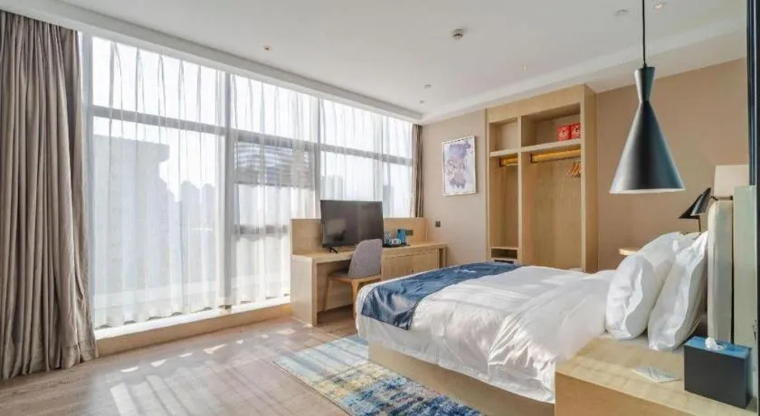 Bed in Echarm Hotel Hefei West Qilitang Metro Station