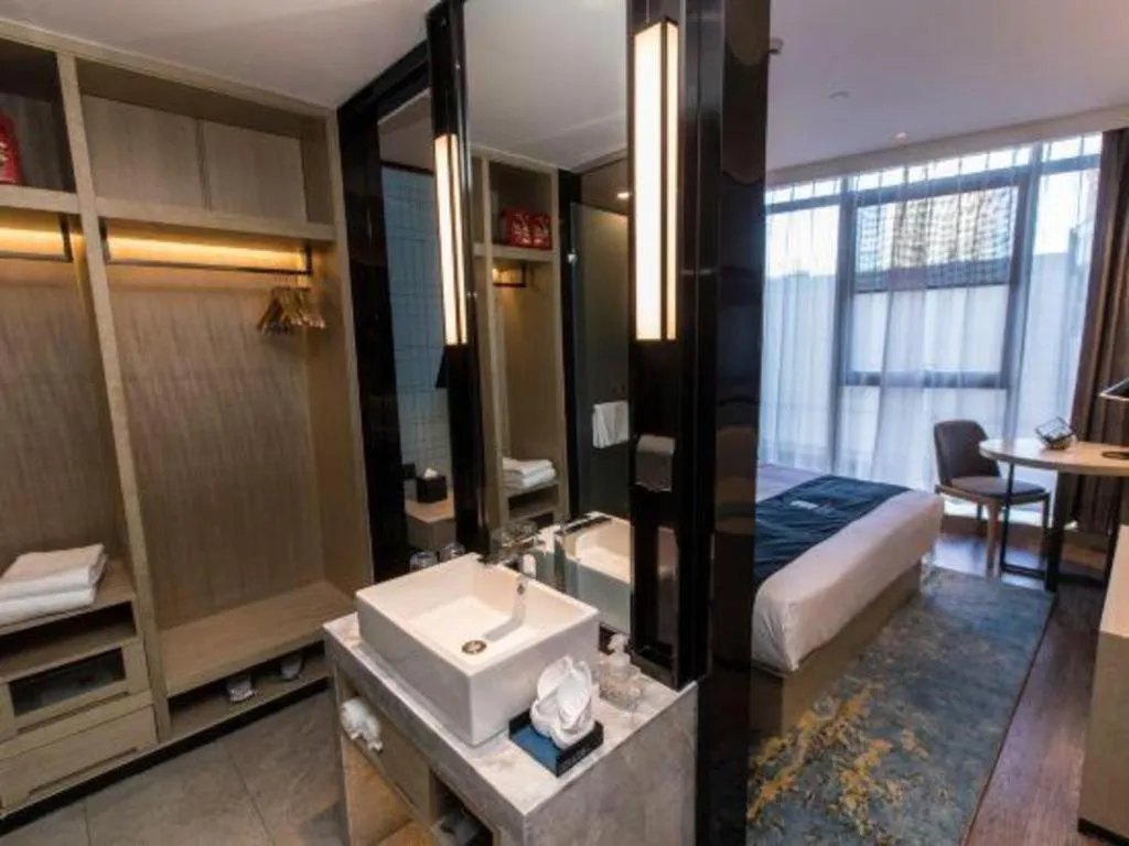 Bed in Echarm Hotel Hefei West Qilitang Metro Station