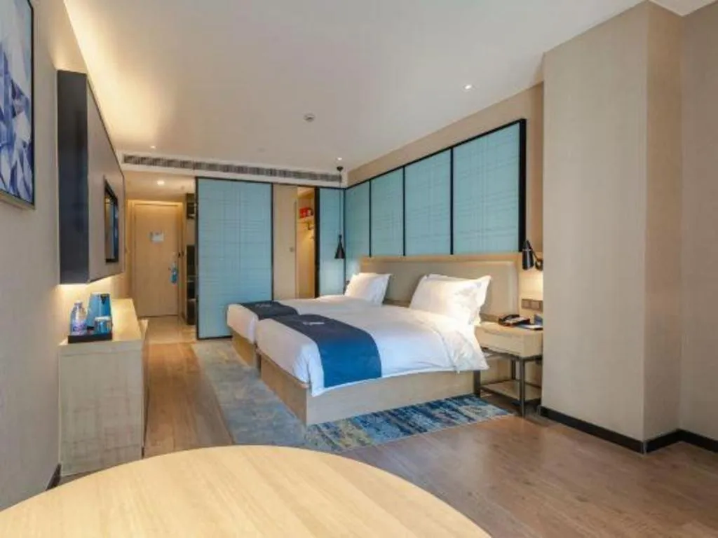 Bed in Echarm Hotel Hefei West Qilitang Metro Station