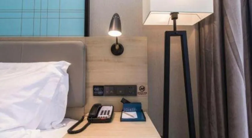 Bed in Echarm Hotel Hefei West Qilitang Metro Station