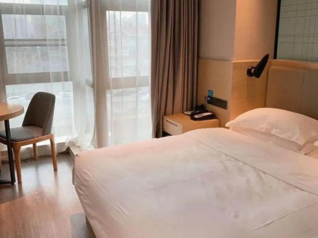 Bed in Echarm Hotel Hefei West Qilitang Metro Station