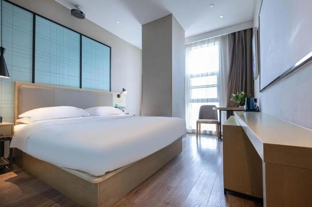 Bed in Echarm Hotel Hefei West Qilitang Metro Station