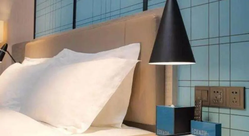 Bed in Echarm Hotel Hefei West Qilitang Metro Station