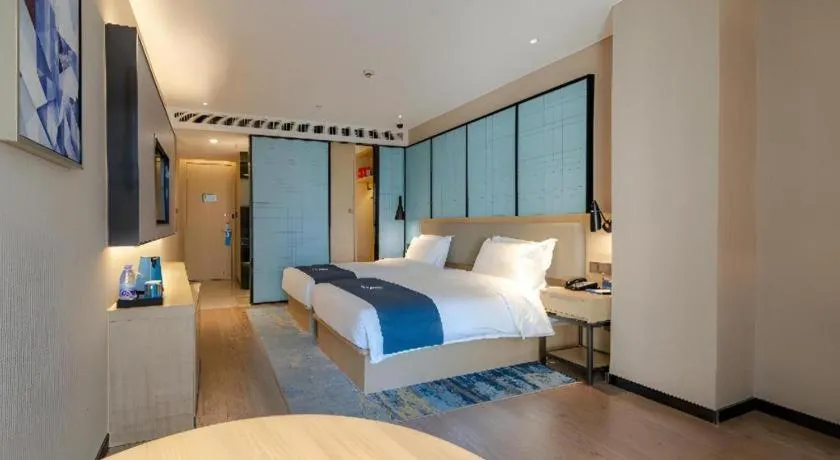 Bed in Echarm Hotel Hefei West Qilitang Metro Station