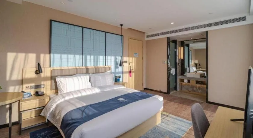 Bed in Echarm Hotel Hefei West Qilitang Metro Station