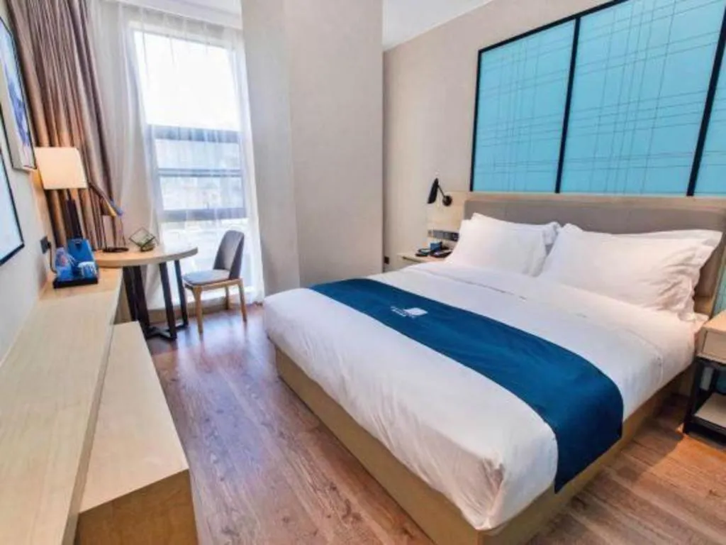 Bed in Echarm Hotel Hefei West Qilitang Metro Station