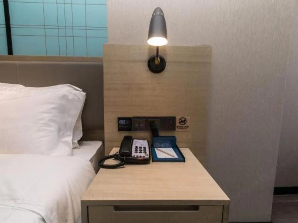 Bed in Echarm Hotel Hefei West Qilitang Metro Station