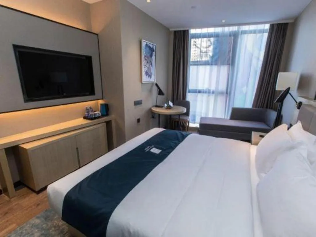 Bed in Echarm Hotel Hefei West Qilitang Metro Station