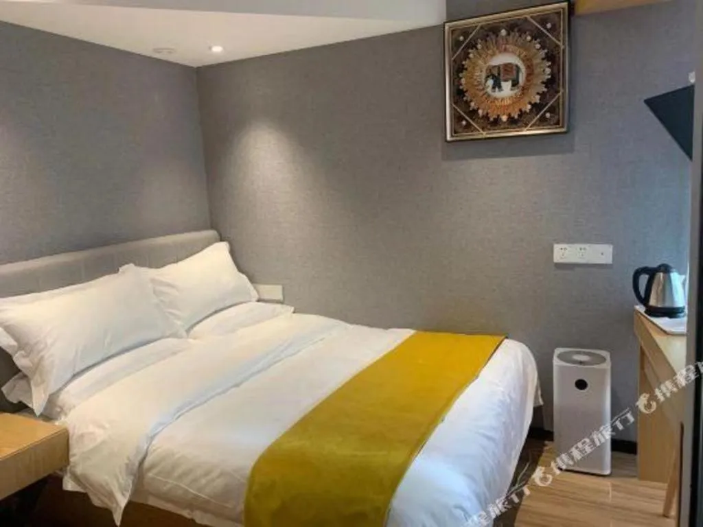 Bed in Echarm Hotel Hefei West Qilitang Metro Station