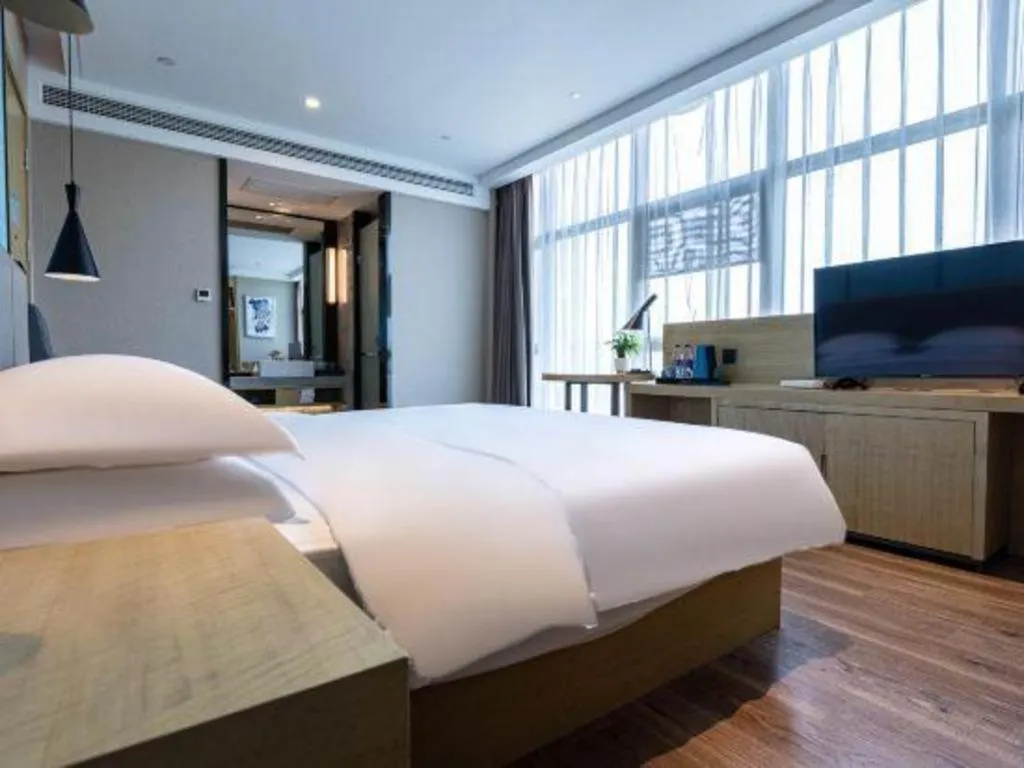 Bed in Echarm Hotel Hefei West Qilitang Metro Station