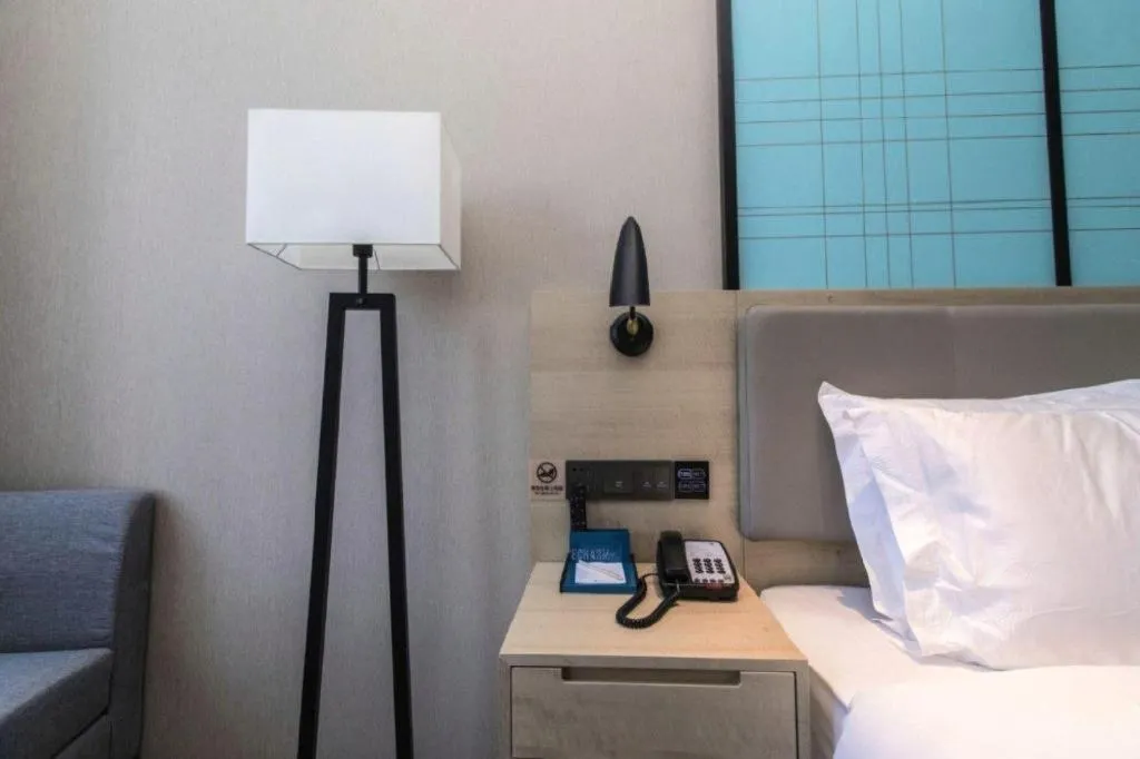 Bed in Echarm Hotel Hefei West Qilitang Metro Station