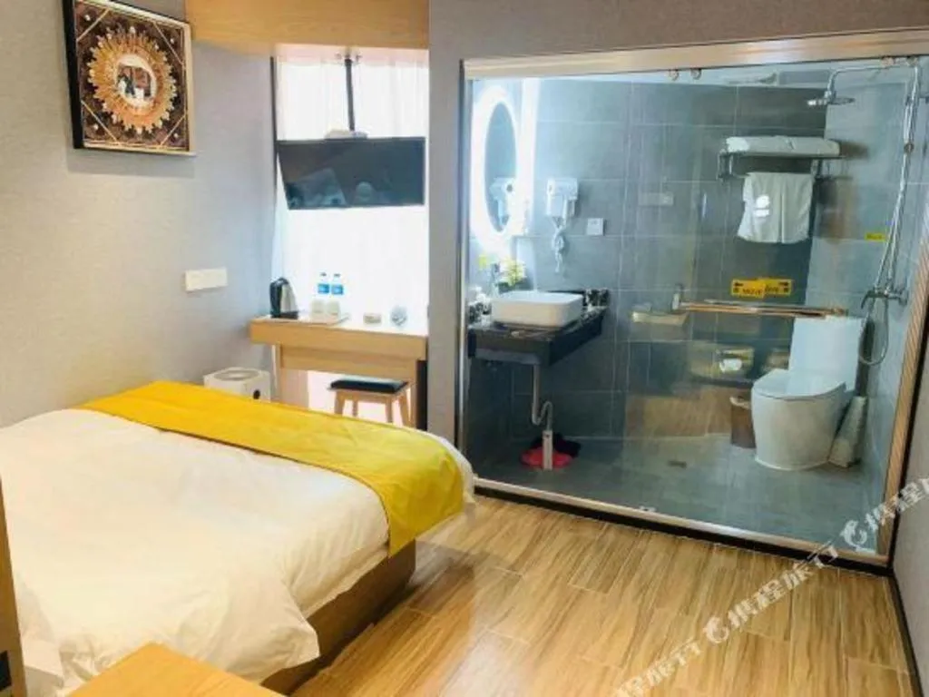 Bed in Echarm Hotel Hefei West Qilitang Metro Station