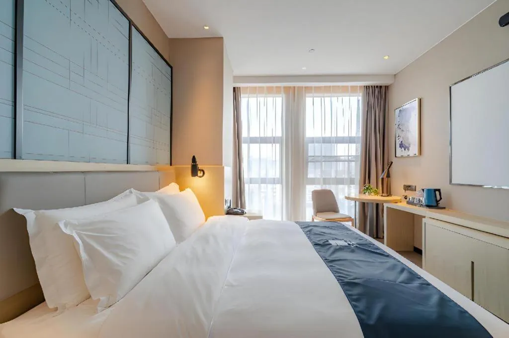 Bed in Echarm Hotel Hefei West Qilitang Metro Station