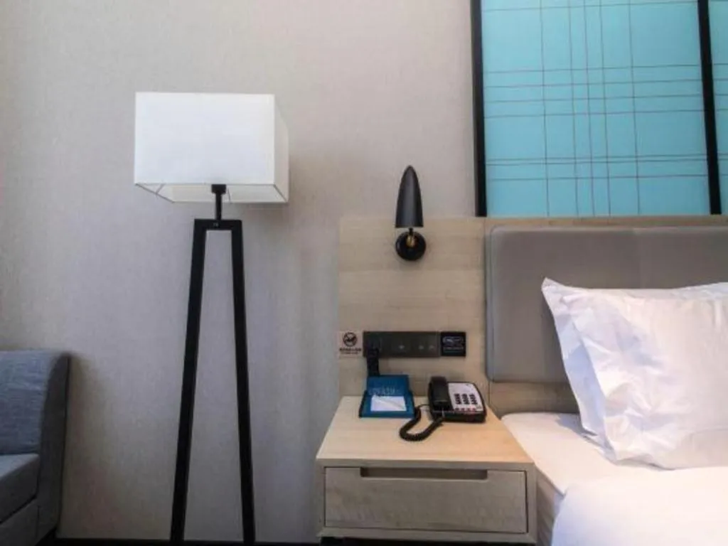 Bed in Echarm Hotel Hefei West Qilitang Metro Station