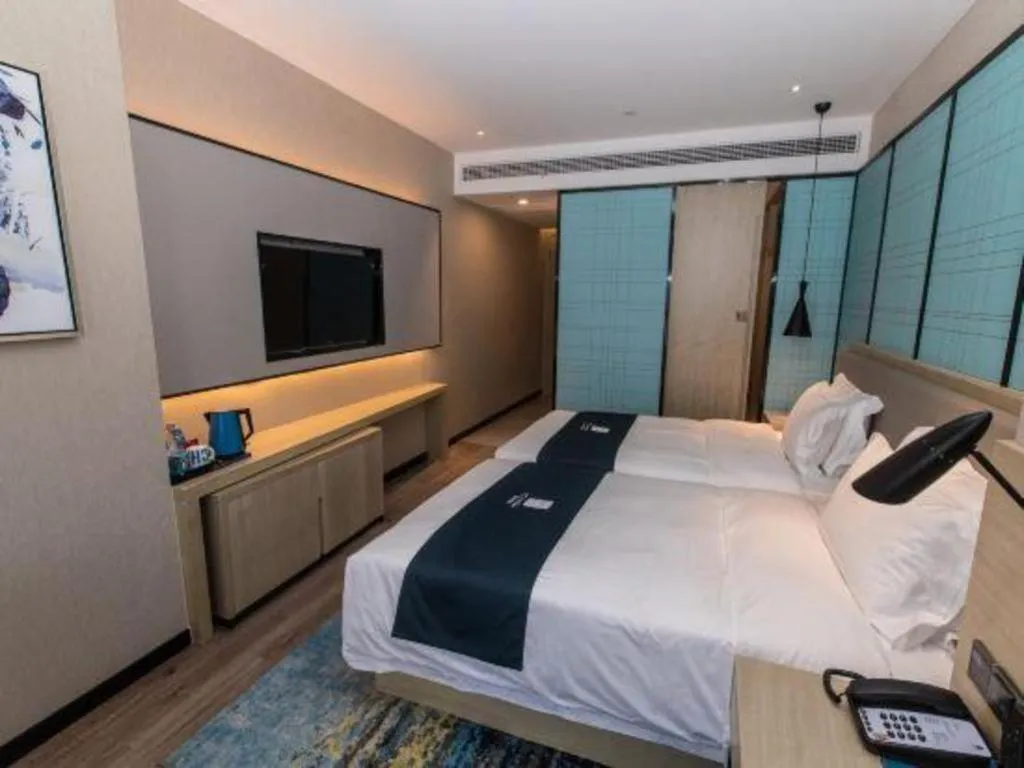Bed in Echarm Hotel Hefei West Qilitang Metro Station