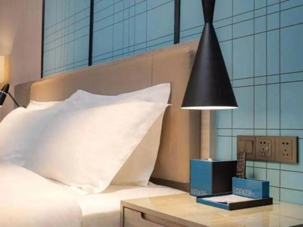 Bed in Echarm Hotel Hefei West Qilitang Metro Station