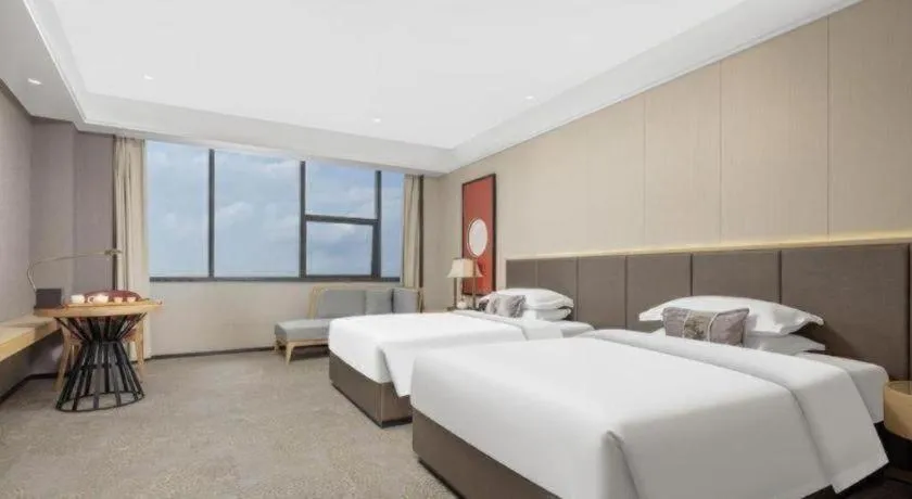 Bed in E-Cheng Hotel Yangjiang Baili Plaza