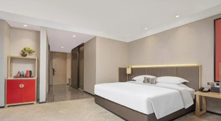 Bed in E-Cheng Hotel Yangjiang Baili Plaza