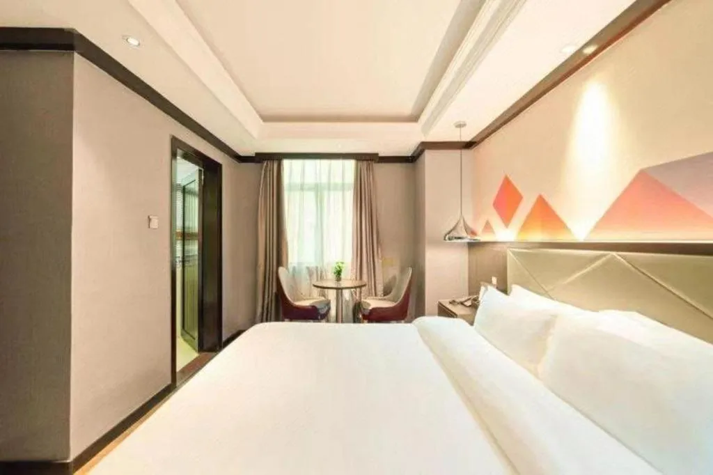 Bed in Borrman Hotel Zhongshan Henglan Xiyong