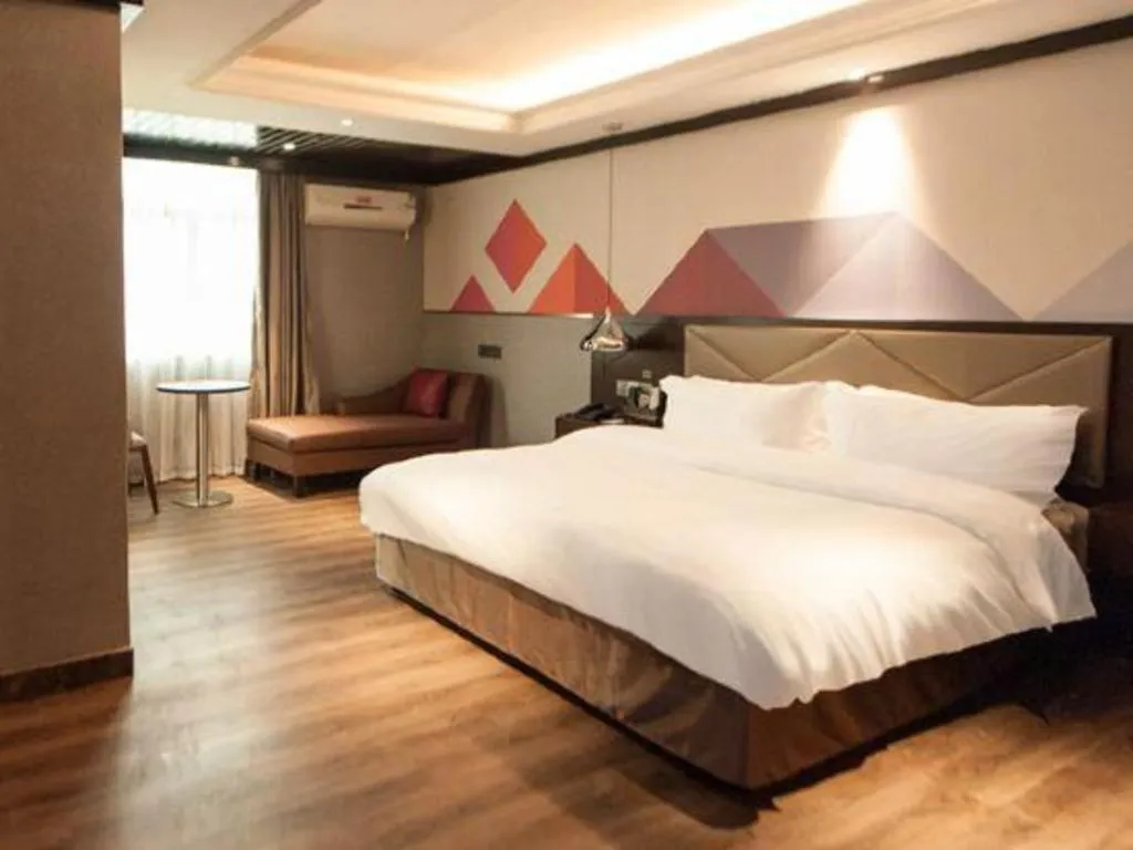 Bed in Borrman Hotel Zhongshan Henglan Xiyong