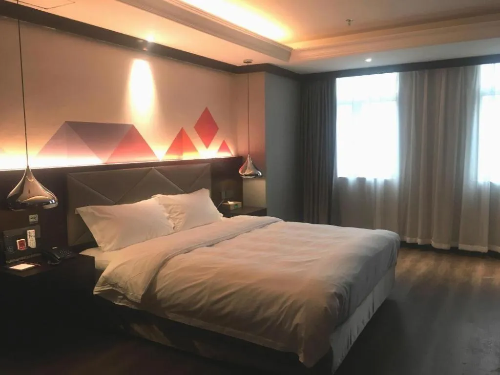 Bed in Borrman Hotel Zhongshan Henglan Xiyong