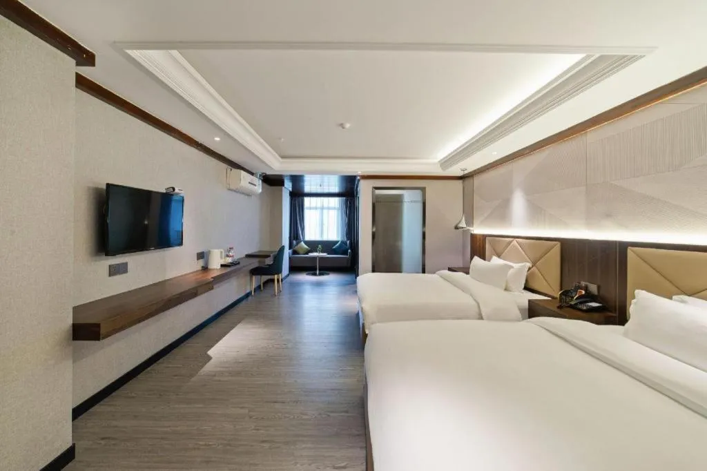 Bed in Borrman Hotel Zhongshan Henglan Xiyong