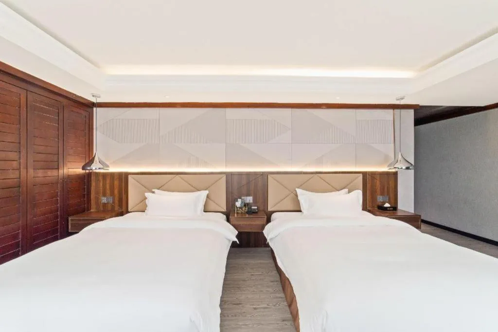 Bed in Borrman Hotel Zhongshan Henglan Xiyong