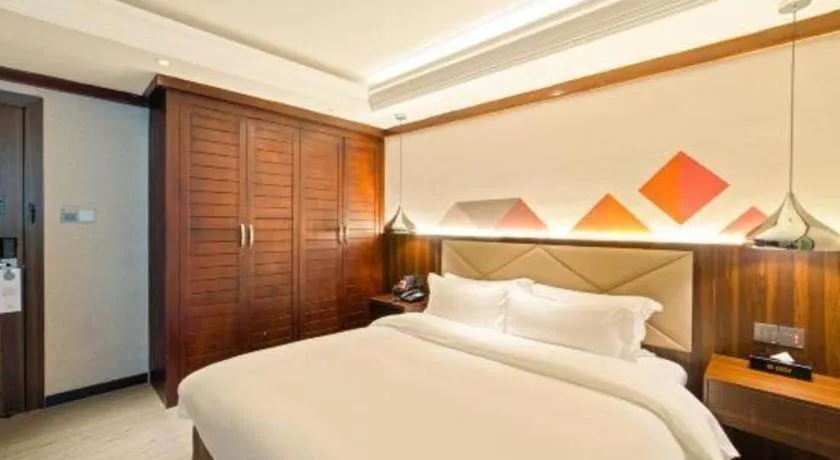 Bed in Borrman Hotel Zhongshan Henglan Xiyong