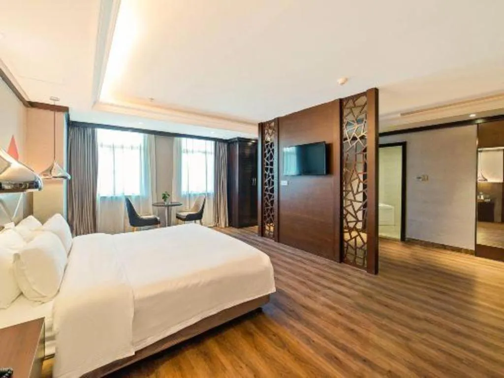 Bed in Borrman Hotel Zhongshan Henglan Xiyong