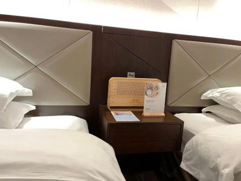 Bed in Borrman Hotel Zhongshan Henglan Xiyong