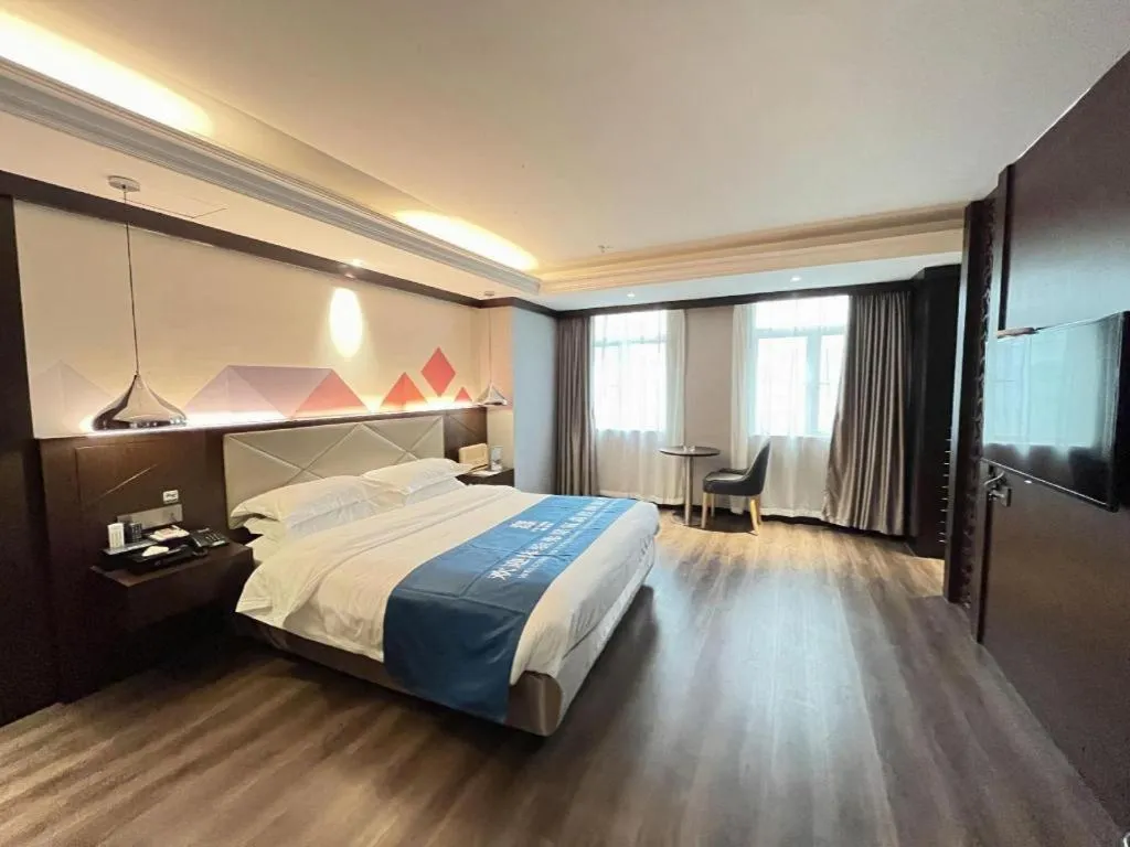 Bed in Borrman Hotel Zhongshan Henglan Xiyong