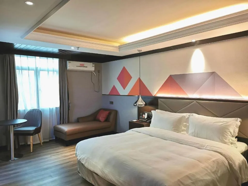 Bed in Borrman Hotel Zhongshan Henglan Xiyong