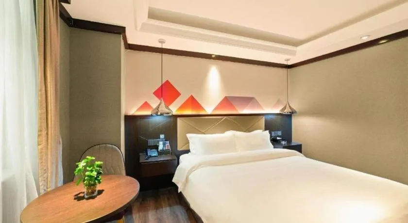 Bed in Borrman Hotel Zhongshan Henglan Xiyong