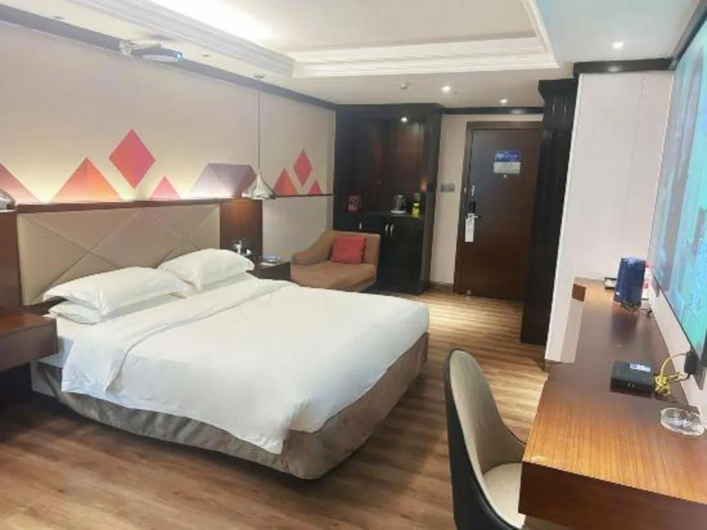 Bed in Borrman Hotel Zhongshan Henglan Xiyong