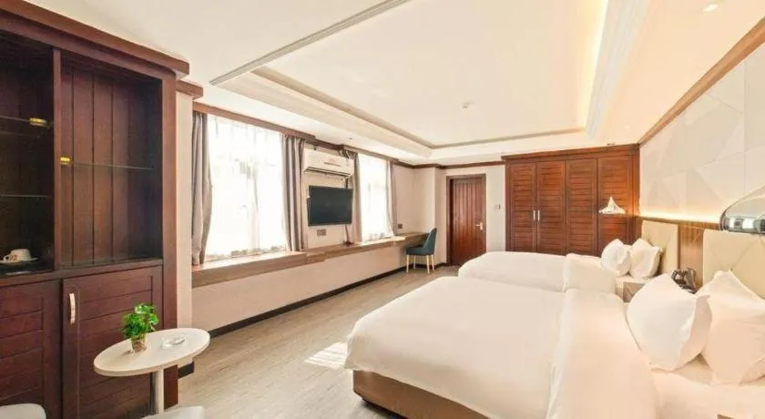 Bed in Borrman Hotel Zhongshan Henglan Xiyong