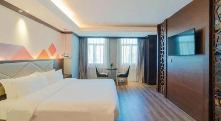 Bed in Borrman Hotel Zhongshan Henglan Xiyong