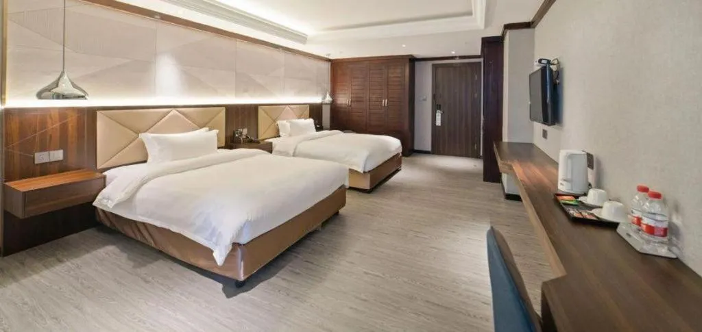 Bed in Borrman Hotel Zhongshan Henglan Xiyong