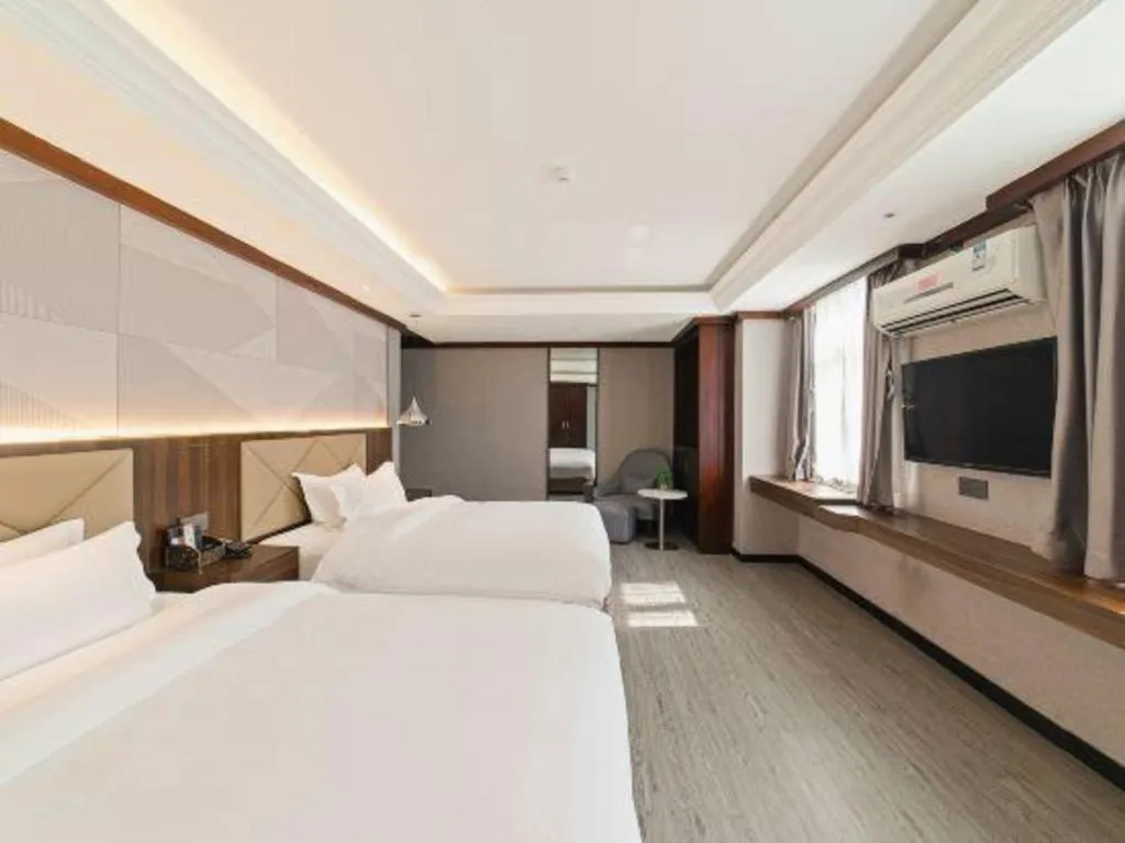 Bed in Borrman Hotel Zhongshan Henglan Xiyong